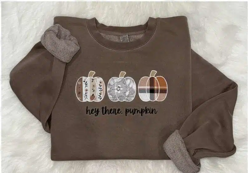 The same design stitched out on a brown sweatshirt